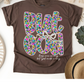 BUT GOD FLORAL PRINT T-SHIRT