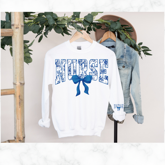 NURSE FLORAL BLUE BOW SWEATSHIRT